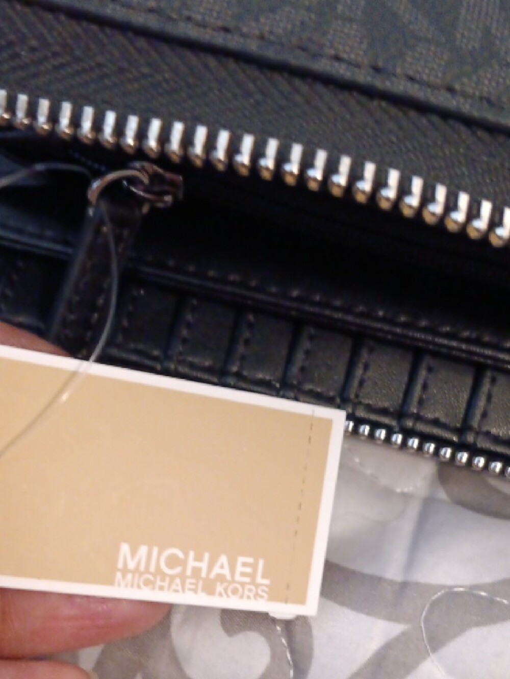 Michael Kors Black Leather Wristlet with Silver Hardware - Picture 12 of 16